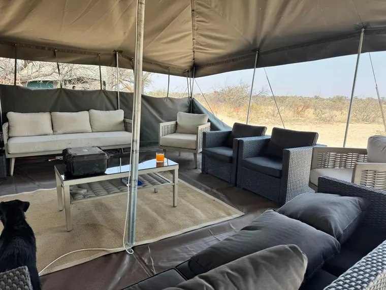 Seating area inside a Botswana safari tent