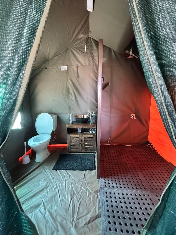 Bathroom and shower inside a safari tent