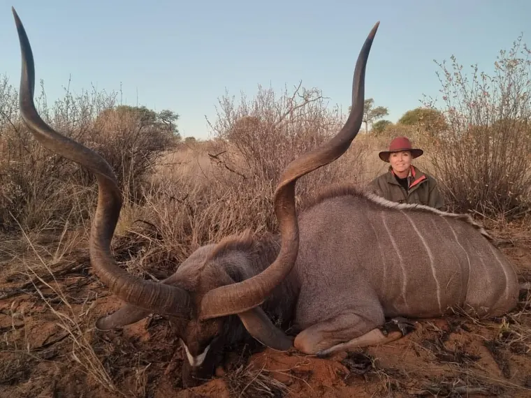 Hunter with a kudu from the Botswana album
