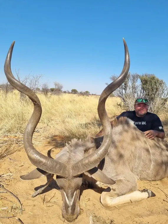 Hunter with a kudu from the Botswana album