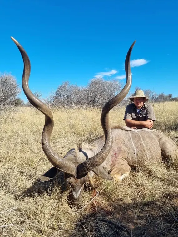 Hunter with a kudu from the Botswana album