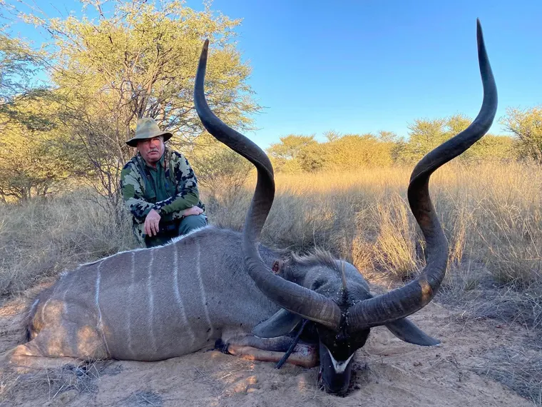 Hunter with a kudu from the Botswana album