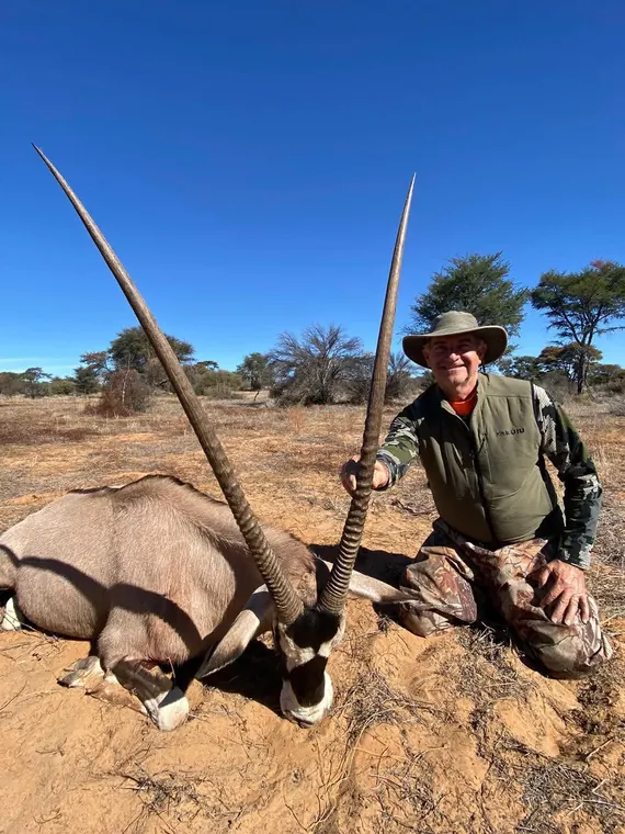 Hunter with a gemsbok from the Botswana album