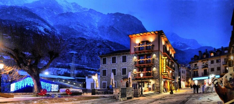 Hotel Solana Benasque and its mountain surroundings at dusk, Spain