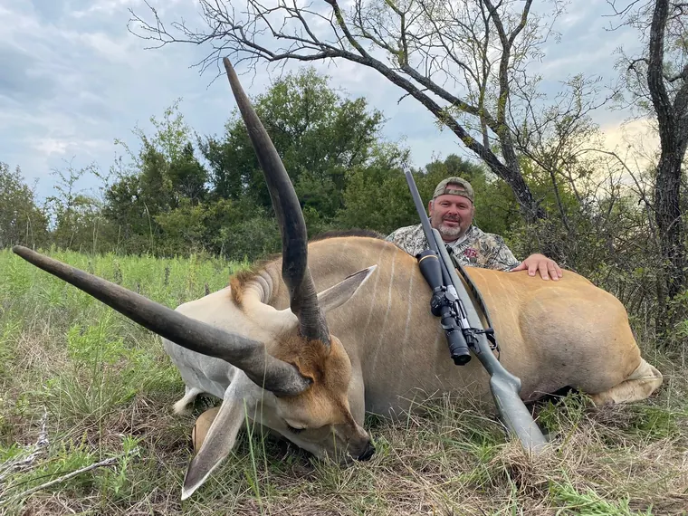 Hunter with an addax in Dublin, Texas