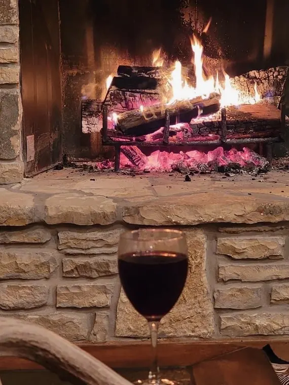A fire burning in the stone fireplace at the Dublin lodge